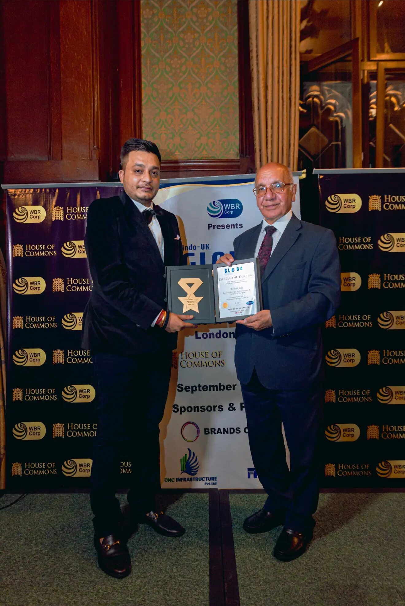 Nitish Jindal receiving the Leading Foreign Policy Liaison and Advisor of the Year recognition at the House of Commons in London
